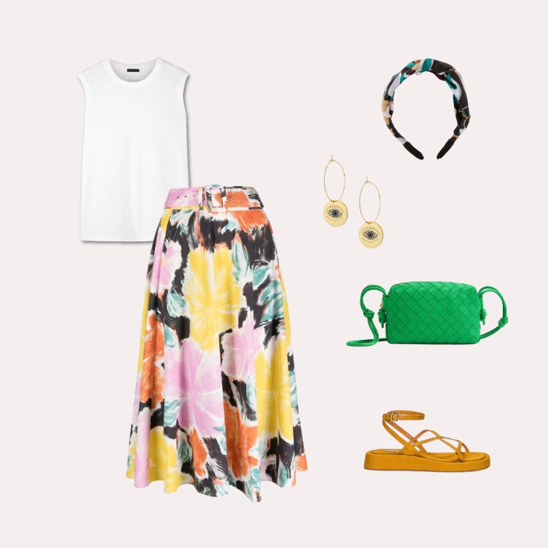 Italy outfit with colorful floral skirt and green bag with yellow sandals